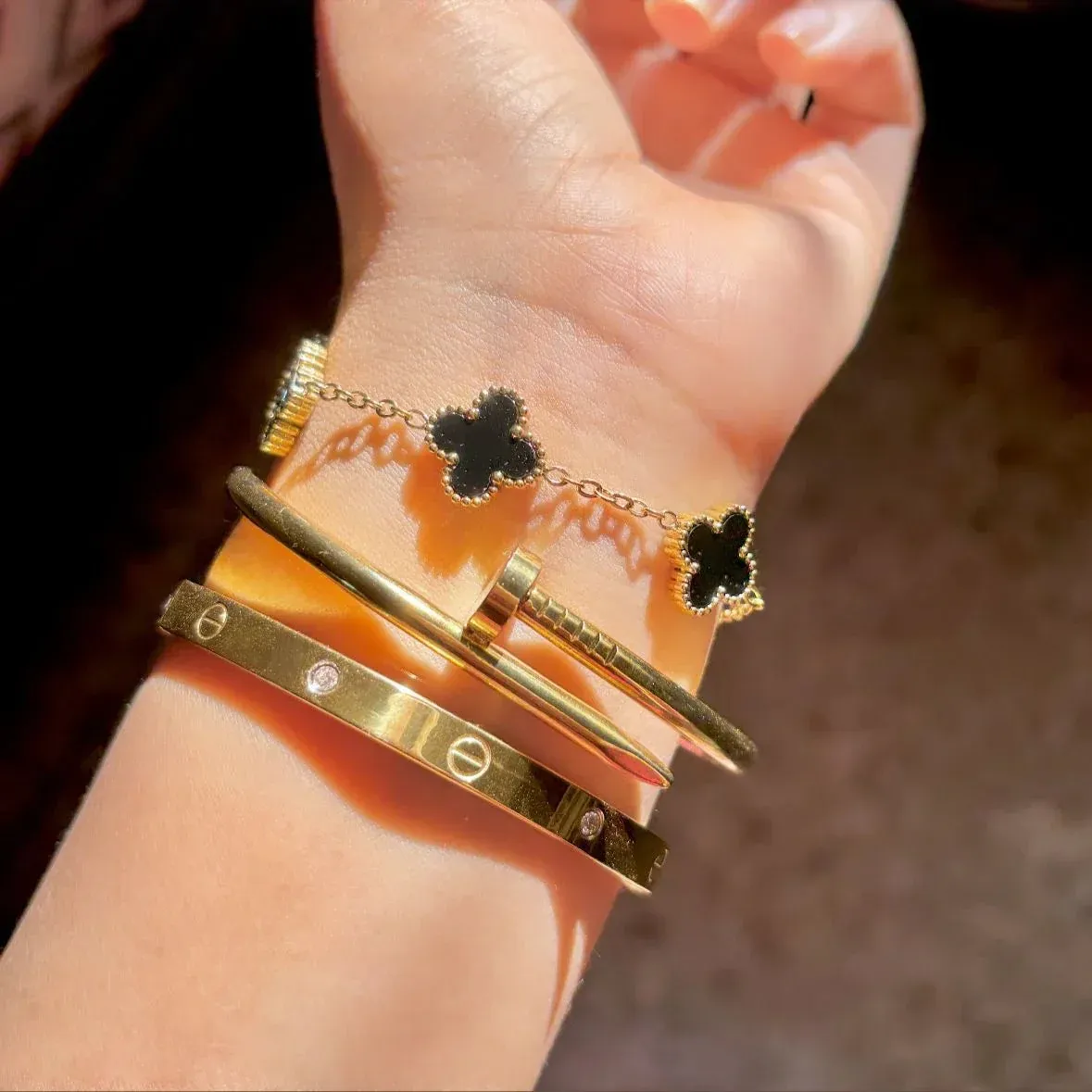 Cartier Nail Love bangle with black clover bracelet Stack - Image 3